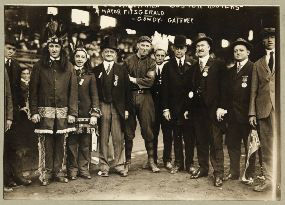 John Francis Fitzgerald, mayor of Boston, full-length portrait, standing, facing front, Hank Gowdy, Mr. Gaffney, and others, on opening day of the World Series, Boston LCCN96509871