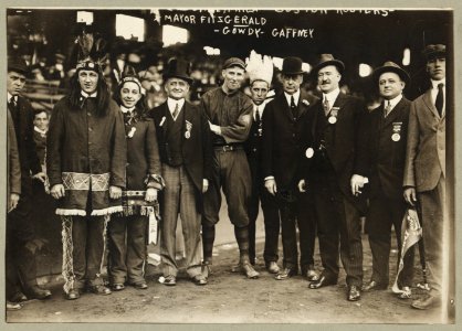 John Francis Fitzgerald, mayor of Boston, full-length portrait, standing, facing front, Hank Gowdy, Mr. Gaffney, and others, on opening day of the World Series, Boston LCCN96509871