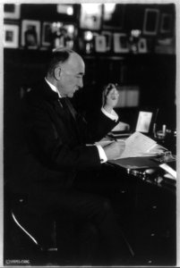 John Hays Hammond, 1855-1936, three-quarter length portrait, seated at desk, facing right LCCN2005680080