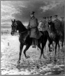 John Joseph Pershing, 1860-1948, full length, on horseback, facing left, followed by others on horseback, all in uniform LCCN2005689196