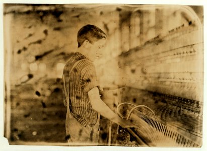 John Lavigul. Has been doffer-boy in mule-spinning room for over a year in Chace Cotton Mill, Burlington, Vt. See photo and label -730. LOC nclc.01729