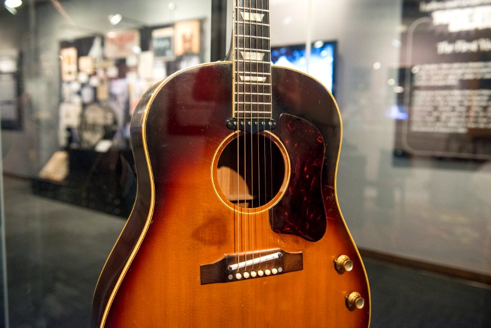 John Lennon's missing 1962 Gibson J-160E guitar in the exhibit - Ladies and Gentlemen... the Beatles! exhibit at LBJ Presidential Library, Austin, TX, 2015-06-12 11.33.12