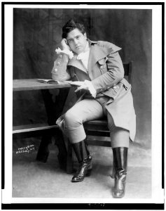 John McCormack, full-length portrait, seated, facing slightly left LCCN92512464