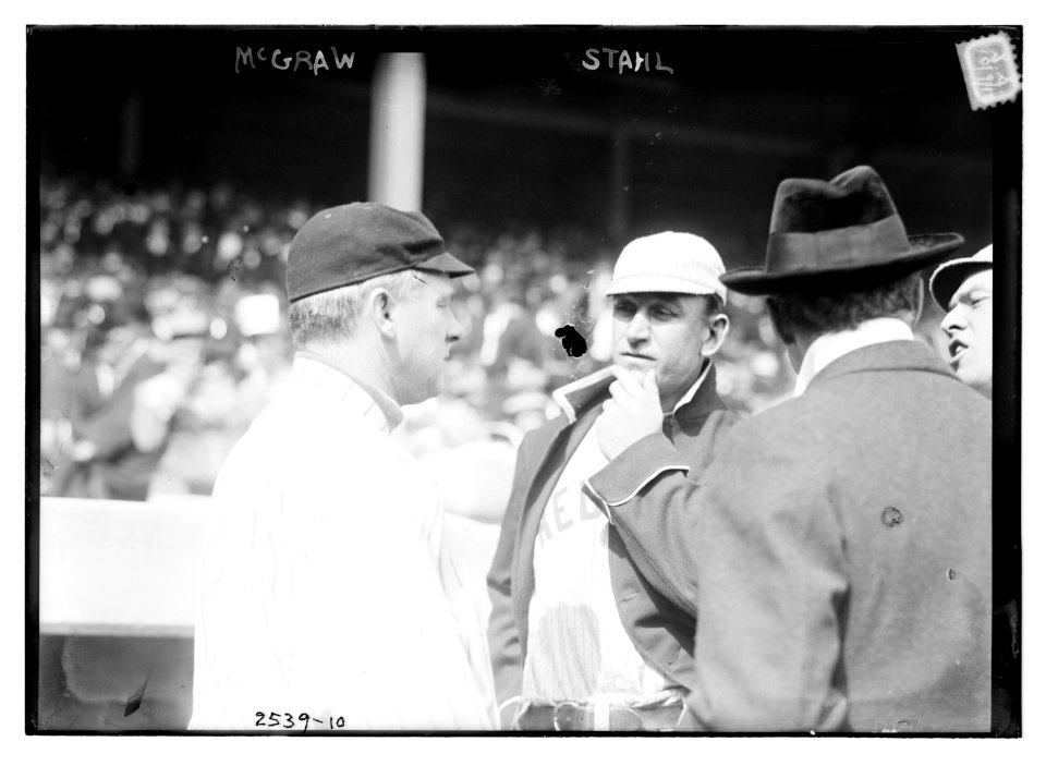 John McGraw (New York NL) at left, speaking to Jake Stahl (Boston AL) prior to a game of the 1912 World Series at the Polo Grounds, NY, October 1912 (baseball) LCCN2014691962