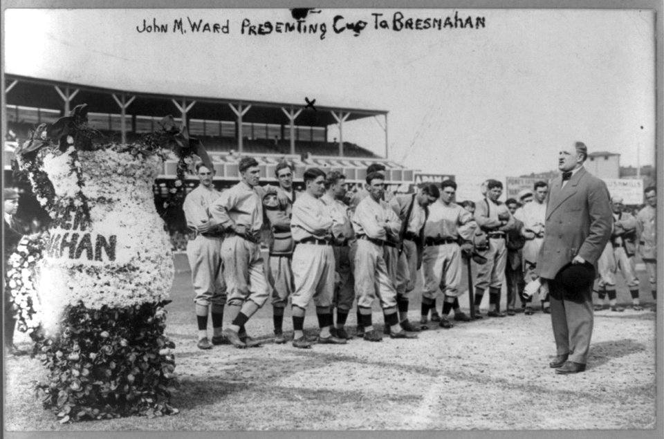 John Montgomery Ward presenting cup to Roger Bresnahan before New York NL players (baseball) LCCN2001704417