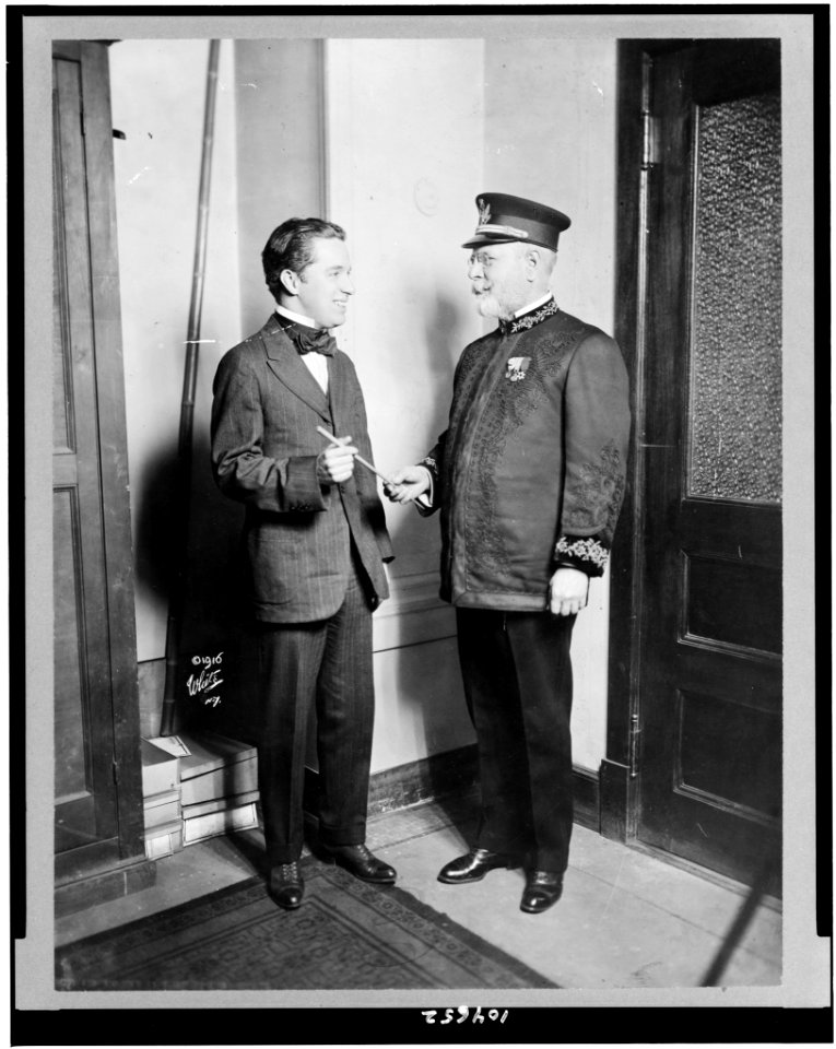 John Philip Sousa in band uniform standing with Charlie Chaplin LCCN92502143