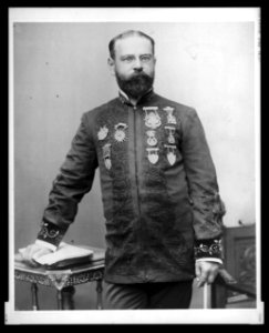 John Philip Sousa, three-quarter length portrait, standing, facing front LCCN2005676156