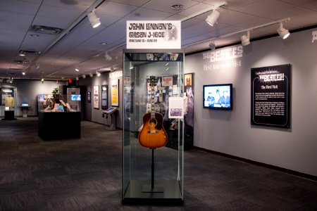 John Lennon's missing 1962 Gibson J-160E guitar in the exhibit - Ladies and Gentlemen... the Beatles! exhibit at LBJ Presidential Library, Austin, TX, 2015-06-23 16.19.03
