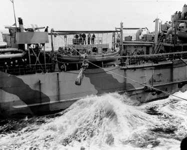 John Thomas Blackburn is transferred from USS Monadnock (CM-9) to USS Santeee (ACV-29) during the North African Operation, 11 November 1942 (80-G-30610)