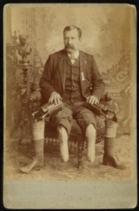 John W. January, veteran of Co. B, 14th Illinois Cavalry Regiment, with prosthetic legs) - Photographed by Bowman, Ottawa, Ills LCCN2016652279 photo