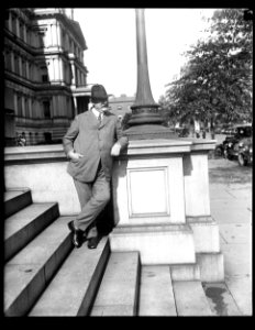 John W. Weeks on steps of State, War, and Navy Building, Washington, D.C. LCCN2016890854