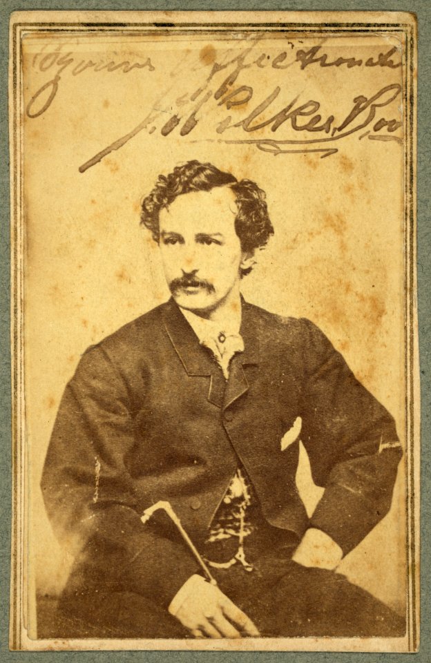 John Wilkes Booth, half-length studio portrait, sitting LCCN2009634256