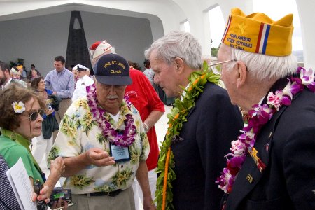 John White, a U.S. Navy Pearl Harbor survivor, speaks to Tom Brokaw