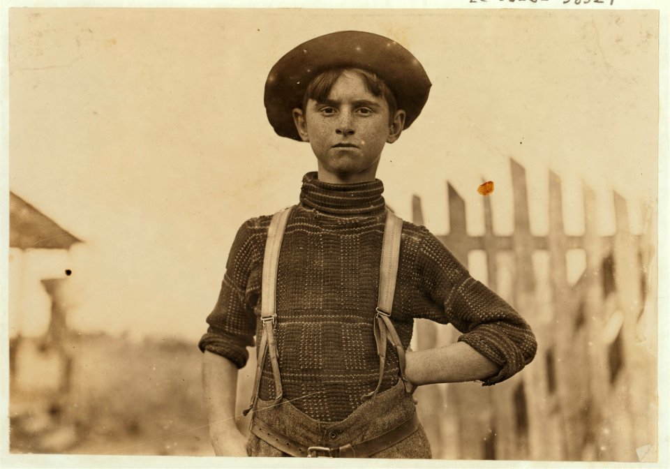 Johns Lewis. Springstein Mill. A typical cotton mill boy. 12 years old -1 year in mill. Weaver-4 looms. Got 40 cents at start-60 cents now. Brother and Pa, in mills. Witness S.R. Hine. LOC cph.3b06140