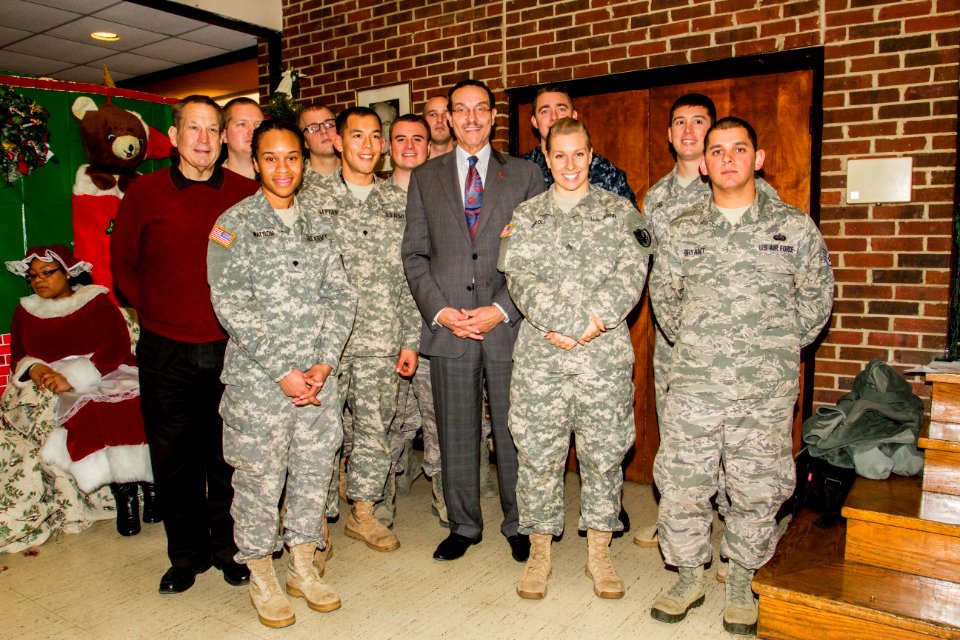 Joint base volunteers, police and Toys for Tots help disadvantaged youth 131218-N-WY366-003