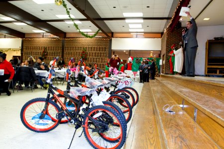 Joint base volunteers, police and Toys for Tots help disadvantaged youth 131218-N-WY366-001 photo