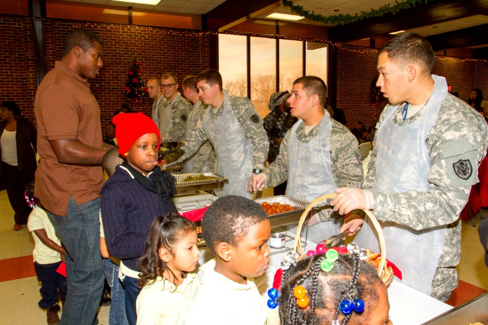Joint Base volunteers, police and Toys for Tots help disadvantaged youth 131218-N-WY366-005