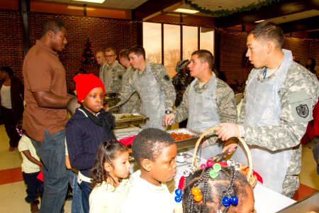 Joint Base volunteers, police and Toys for Tots help disadvantaged youth 131218-N-WY366-005 photo
