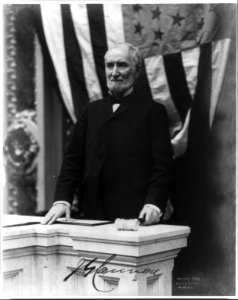Joseph Gurney Cannon, 1836-1927, half-length portrait, standing, with gavel in hand, facing left LCCN2005685762