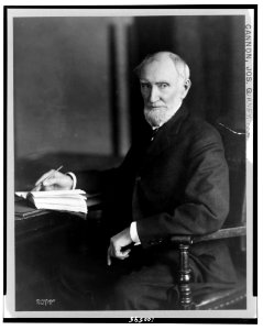 Joseph Gurney Cannon, three-quarter length portrait, seated, facing left LCCN90713059