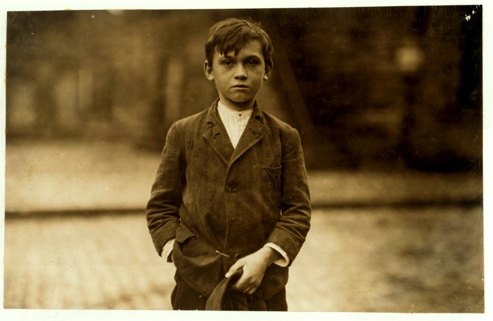 Joseph Philip, 5 Wall St., pin boy in Les Miserables Bowling Alley, said 11 years old and worked until midnight every night- said he made $2.25 last week and $1.76 the week before. LOC cph.3b43678