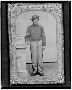 Josua P. Graffam, Sgt., 1st D.C. & 1st Maine Cavalry, Co. B., U.S.A., full-length portrait, facing front LCCN2005695740