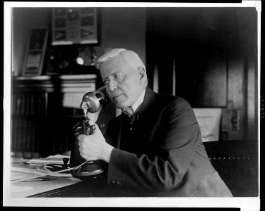 Joshua W. Alexander, Democrat Congressman from Missouri, half-length portrait, seated with candlestick telephone in hand) - National Photo Co., Washington, D.C LCCN2008680675