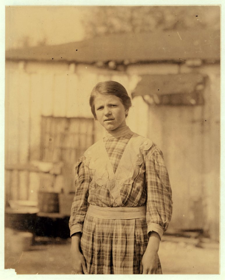 Josie, 13 year old shucker, Shucks ten pots a day or more. Been working six years. Varn and Platt Canning Co. LOC nclc.01007