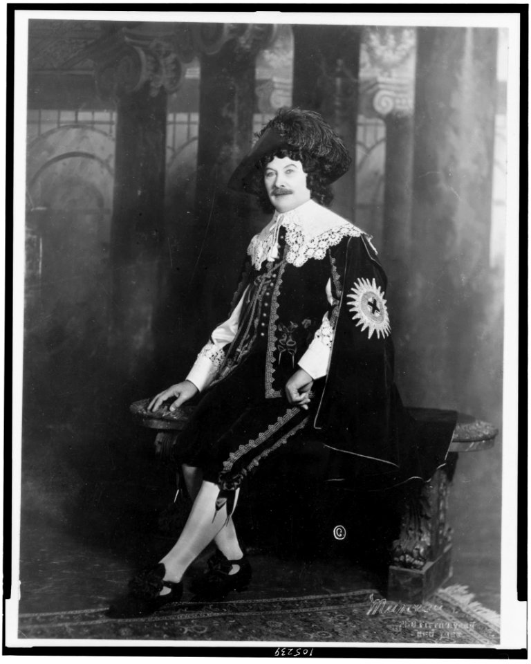 Judge Elbert H. Gary, full-length portrait, in fancy dress or costume, seated, facing left) - Marceau, New York LCCN92507066