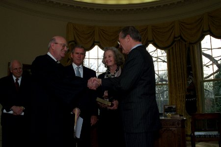 Judge Laurence Silberman congratulates Donald Rumsfeld photo