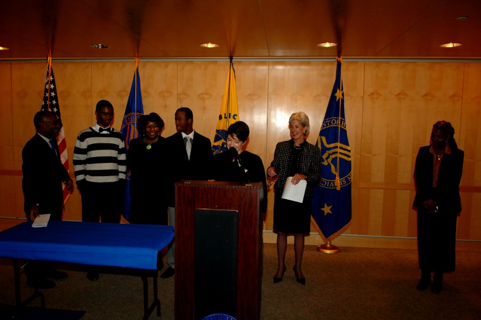 Judge McKenna, of DC Family Courts, begins the adoption ceremony at HHS