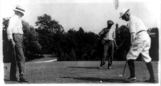 Justices of the Supreme Court at work and play, Associate Justice Joseph McKenna (left) on the links with former Justice Pitney LCCN89708772