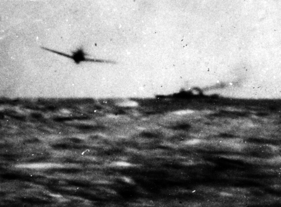 Kamikaze about to crash into USS Kidd (DD-661) off Okinawa, Japan, on 11 April 1945 (NH 75767)