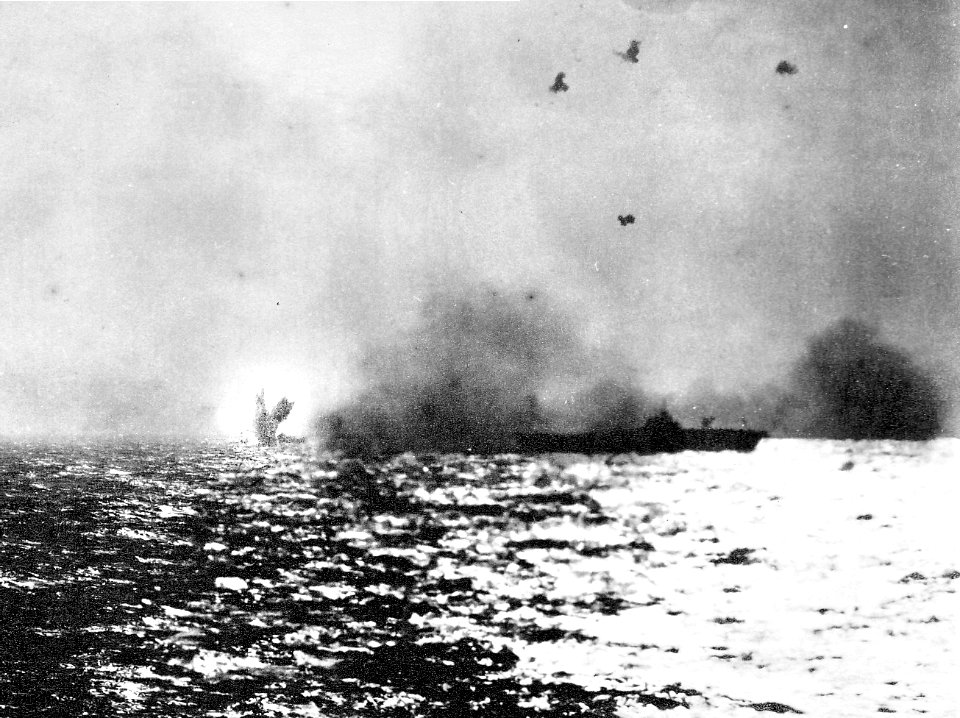 Kamikaze crashes aft of USS Bunker Hill (CV-17) 1945