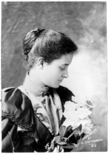 Kaiulani in Boston, 1893, facing right, holding flowers, photograph by Elmer Chickering, Library of Congress