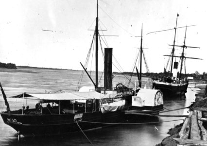 StateLibQld 1 137131 Queensland Government paddle steamer Kate and the Black Swan ahead at Gladstone, ca. 1870