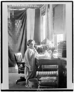 Katherine Augusta Westcott Tingley, half-length portrait, seated at desk, facing right LCCN97518117 photo