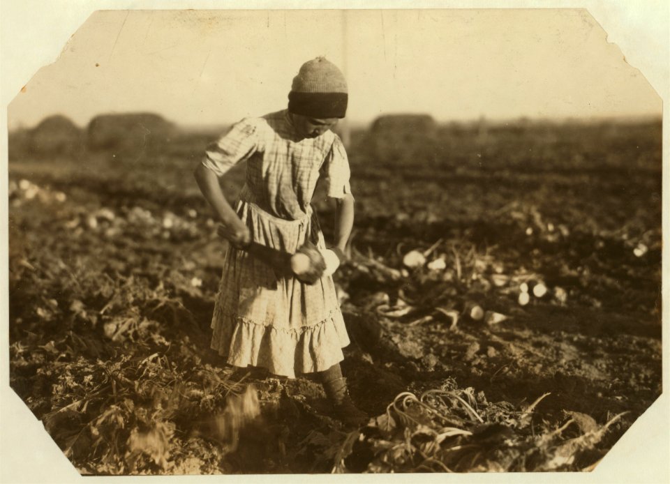Katie Wohn, twelve-year-old topper. Said she cut a hole in her leg recently with the hook on the end of the knife. See Hine report. Photo Oct. 22-15. LOC nclc.00336