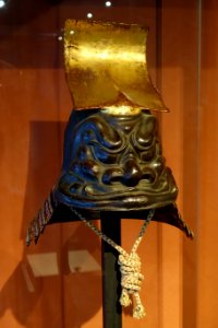 Kawari kabuto (elaborately shaped helmet) symbolizing the cliffs of Ichinotani, Japan, late Edo period, 1800s AD, iron, gold, leather, papier-mache - The Ann and Gabriel Barbier-Mueller Museum - DSC05483
