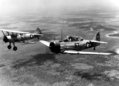 Kaydet and Texan in flight c1948