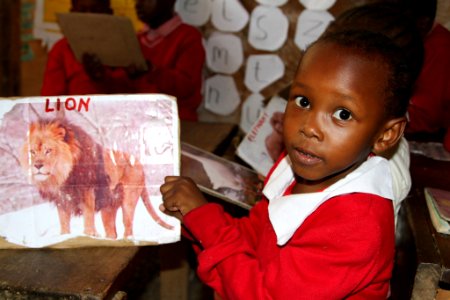 Kenya Marian Awilo reads off a chart (15659208387)