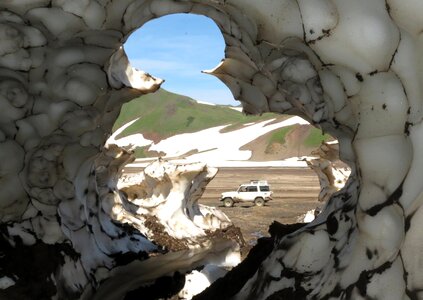 Snow cave mountain plateau gully photo