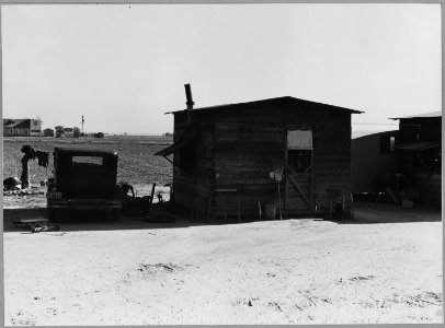 Kern County, California. Housing on abandoned grower's ranch camp, now being occupied as permanent r . . . - NARA - 521716