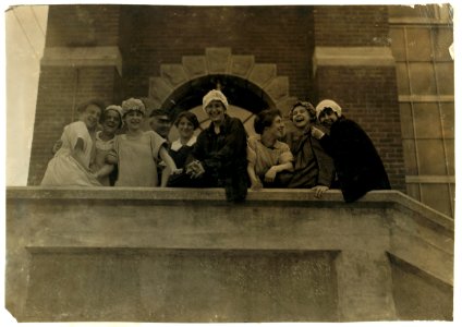 Kerr Thread - Noon hour. Having good time with the camera man. This mill has a high type of operatives. LOC cph.3b23469