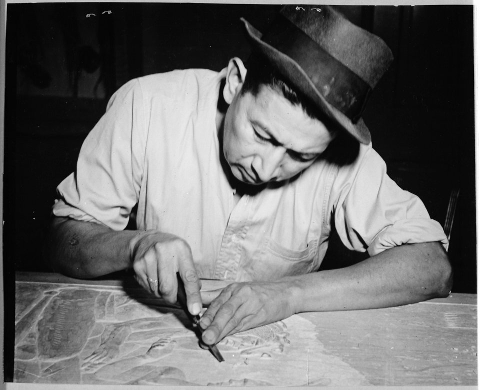 Kidd Smith, Seneca carver, at work in the Tonawanda Community House, 1940 - NARA - 519162