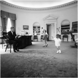 Kennedy children visit the Oval Office. President Kennedy, Caroline Kennedy, John F. Kennedy ,Jr. White House, Oval... - NARA - 194242 photo