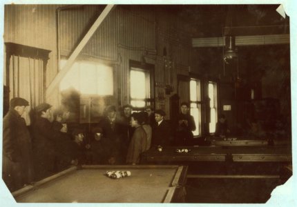 Killing time. Boys and men (many of them workers) hanging around Swifts' Pool Room. Saturday P.M. A common sight any day. Educational influences bad- stories and remarks will not bear LOC nclc.04780