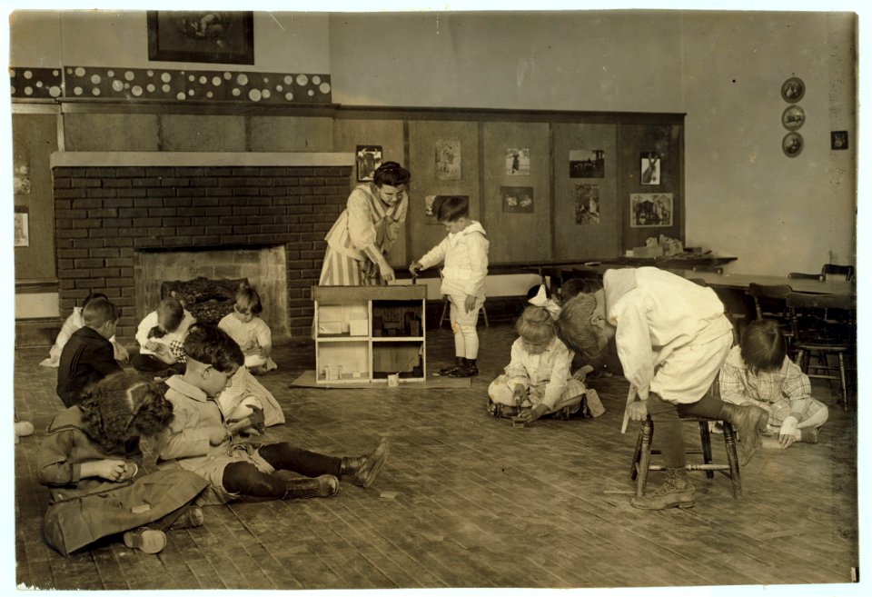 Kindergarten children in Horace Mann School working on doll houses. See Bliss report. LOC nclc.05238