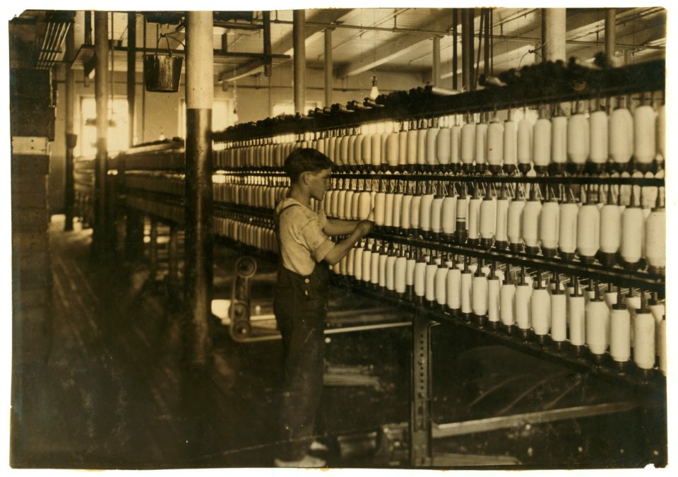 King Philip - Mule Spinning. Back boy - Herbert Heywood, 43 Miller St. - age 14 years. LOC nclc.03086