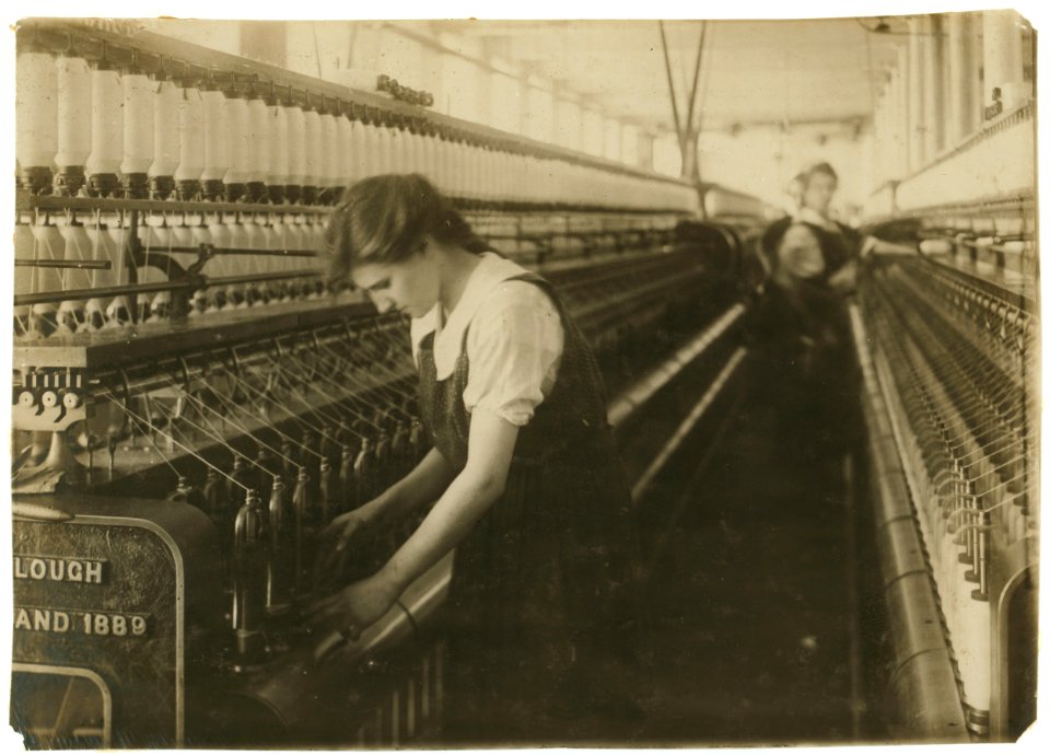 King Philip Mill - Card Room. Doffer on Jack Speeder. Bertha Bonneau, 15 years, 105 Slade St. LOC cph.3b33420